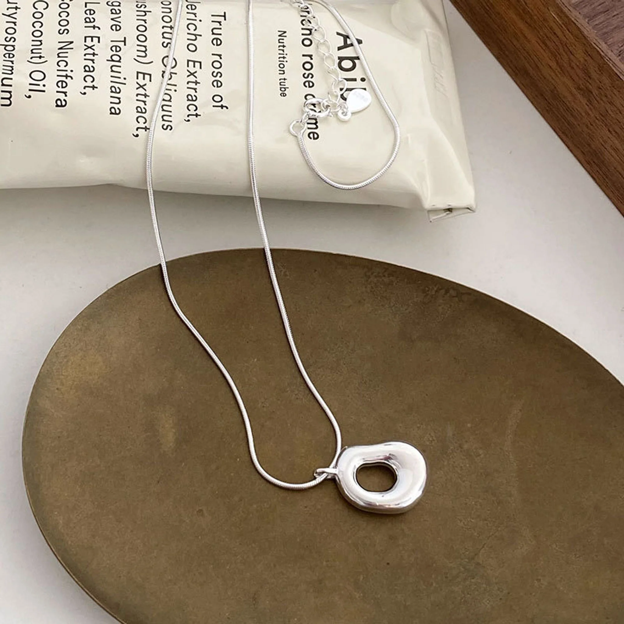 Irregular Hollow Oval Necklace - Image 4